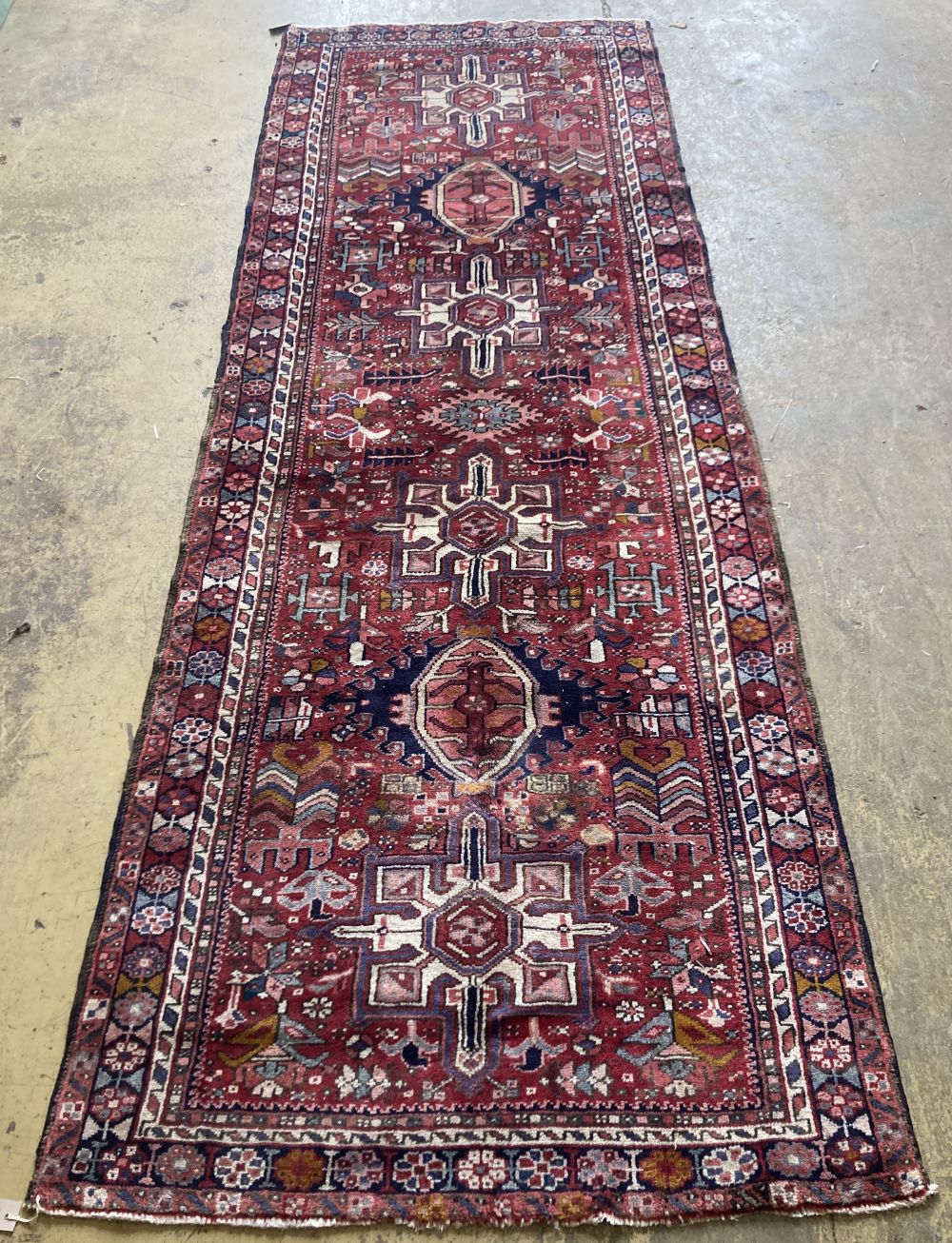 A Karejeh carpet, 305 x 105cm